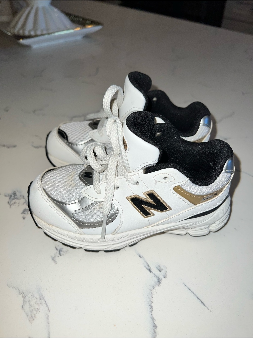 New Balance Kids White, Black & Gold Athletic Sneakers